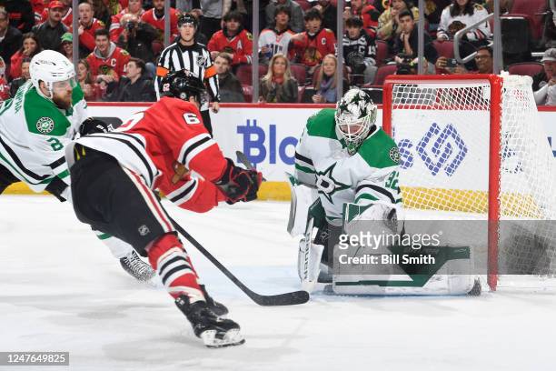 Goalie Matt Murray of the Dallas Stars gloves the puck shot by Brett Seney of the Chicago Blackhawks in the third period at United Center on March...