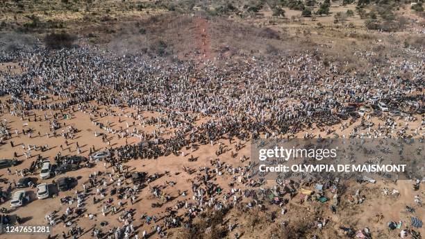 An aerial view of the thousands of people who came especially to attend the prayers and blessings of the healer Amsétou Nikiéma, nicknamed Adja, in...