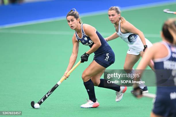 Agostina Alonso of the Argentina Women's National field hockey team and Ashley Sessa of the USA Women's National field hockey team in action during...