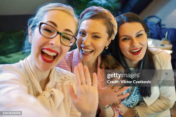 women taking a selfie in a cafe - aleksandra cvetkovic stock pictures, royalty-free photos & images