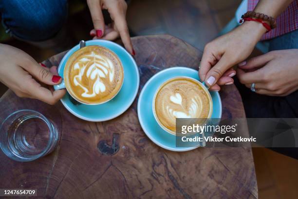 coffee time with friends - aleksandra cvetkovic stock pictures, royalty-free photos & images