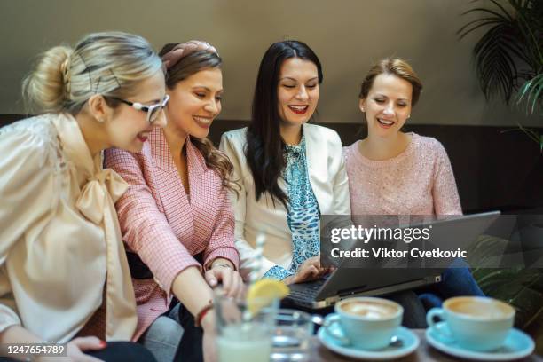 young business women using laptop - aleksandra cvetkovic stock pictures, royalty-free photos & images