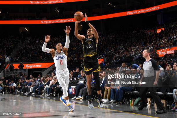 Jordan Poole of the Golden State Warriors shoots a three point basket during the game against the LA Clippers on March 2, 2023 at Chase Center in San...