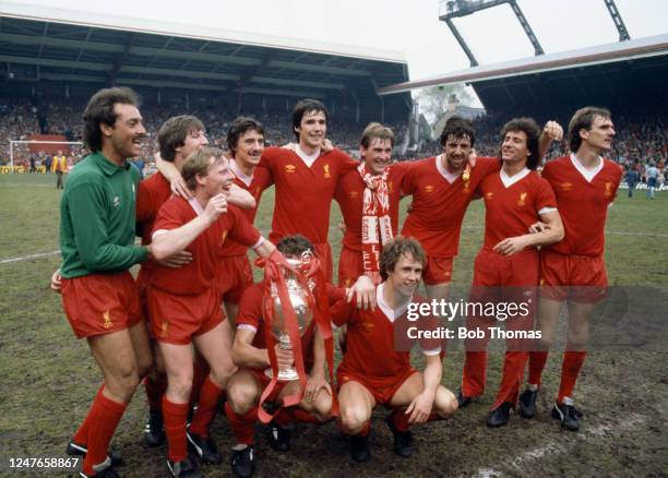 Liverpool players celebrate with the League Championship trophy after the Football League Division One match between Liverpool and Tottenham Hotspur...