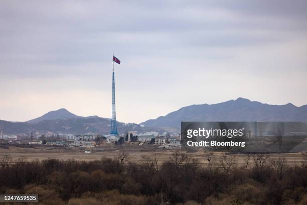 North Korean flag flies above North Korea's Gijungdong village, from the truce village of Panmunjom in the Demilitarized Zone in Paju, South Korea,...