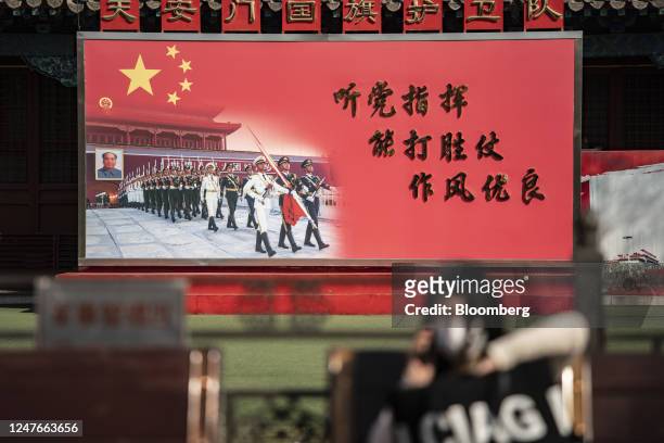 Billboard at a People's Liberation Army Flag Guard barrack near the Forbidden City in Beijing, China, on Friday, March 3, 2023. China's annual...