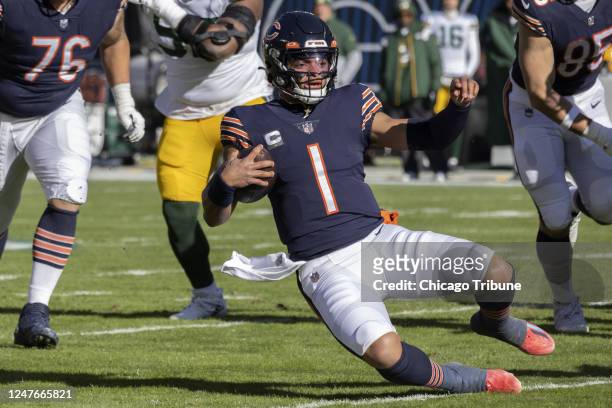 Chicago Bears quarterback Justin Fields runs the ball during the first quarter of the Chicago Bears versus Green Bay Packers game Sunday, Dec. 4 at...