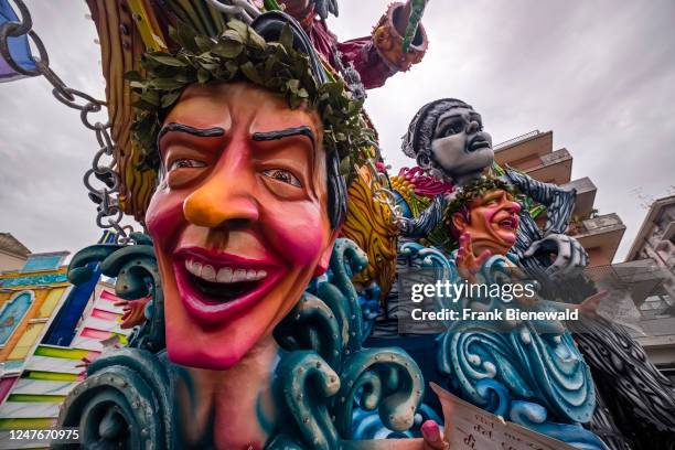 Huge floats with colourful, moving figures are pulled through the streets of the town during the Acireale Carnevale.