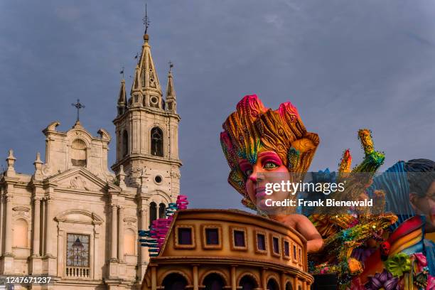 Huge floats with colourful, moving figures are pulled through the streets of the town during the Acireale Carnevale.