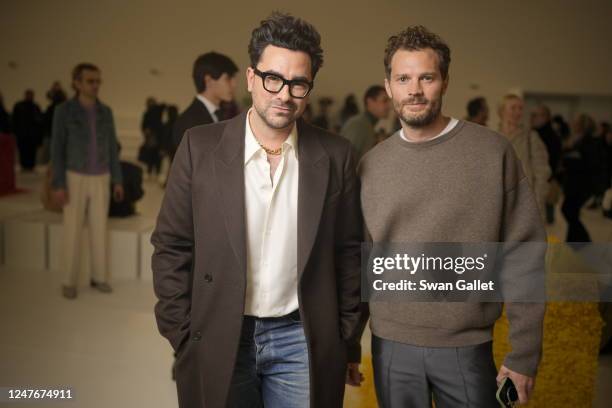 Dan Levy and Jamie Dornan at Loewe Fall 2023 Ready To Wear Runway Show on March 3, 2023 at Chateau de Vincennes in Paris, France.