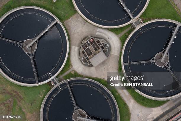 An aerial view shows the sedimentation tanks at the Thames Water Long Reach water treatment facility on the banks of the Thames estuary in Dartford,...