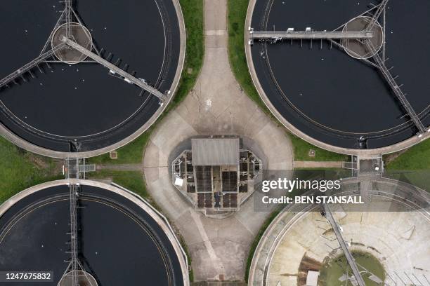 An aerial view shows the sedimentation tanks at the Thames Water Long Reach water treatment facility on the banks of the Thames estuary in Dartford,...