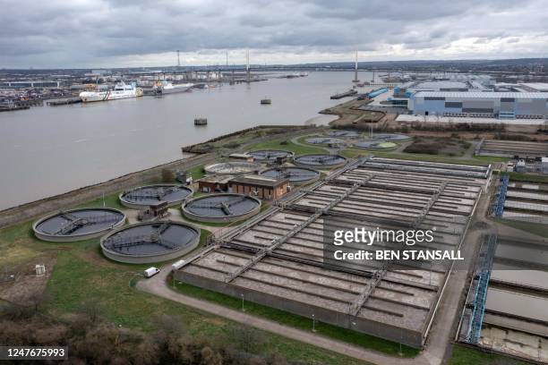 An aerial view shows the Thames Water Long Reach water treatment facility on the banks of the Thames estuary in Dartford, east of London, on March 3,...