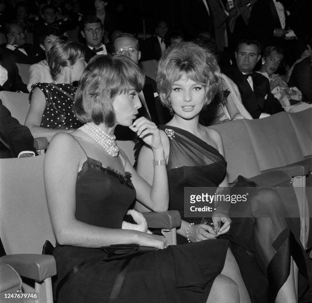 Italian actress Elsa Martinelli and Danish actress Annette Vadim attend the premiere of the film "Et mourir de plaisir" directed by Roger Vadim in...