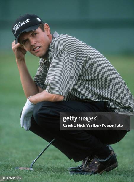 Andrew Coltart of Scotland lines up a putt during the second round of the Compass Group English Open at Hanbury Manor on June 4, 1999 near Ware,...