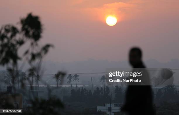 General view of the sunset in Juhr al-Deek, southeast of Gaza City, Palestine, on March 3, 2023 is seen.