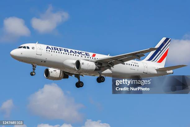 Air France Airbus A320 commercial jet aircraft as seen flying for landing at the runway of London Heathrow Airport in the summer blue sky. The...