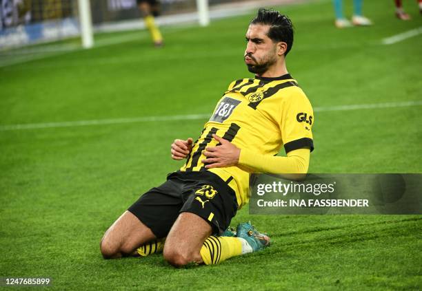 Dortmund's German midfielder Emre Can celebrates after scoring during the German first division Bundesliga football match between Borussia Dortmund...