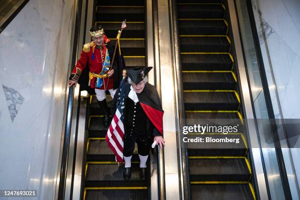 Attendees dressed as former US President George Washington and "MAGA" King during the Conservative Political Action Conference in National Harbor,...