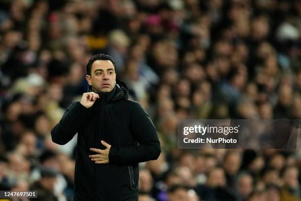 Xavi Hernandez head coach of Barcelona during the Copa del Rey semi-final first leg match between Real Madrid and FC Barcelona at Estadio Santiago...