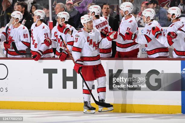 Paul Stastny of the Carolina Hurricanes celebrates with teammates on the bench after scoring a goal against the Arizona Coyotes during the first...