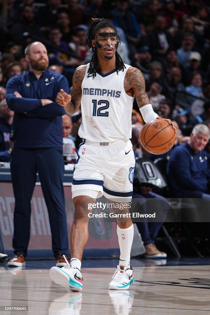 Ja Morant of the Memphis Grizzlies dribbles the ball during the game ...