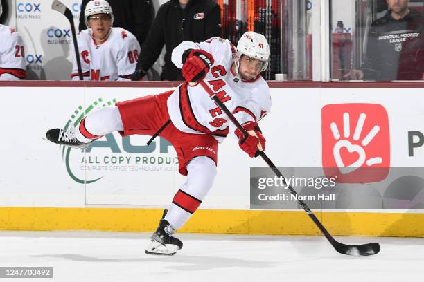 Shayne Gostisbehere of the Carolina Hurricanes takes a shot on goal against the Arizona Coyotes during the second period at Mullett Arena on March...