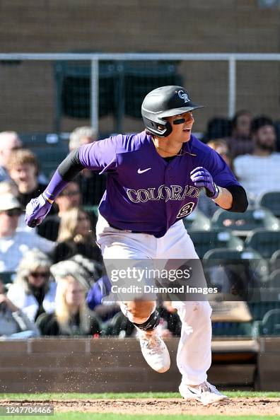 Drew Romo C Drew Romo of the Colorado Rockies runs out a three-run triple during ...