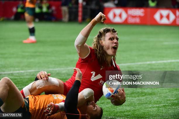 Canadas Thomas Isherwood cheers after scoring against Australia during HSBC Canada Sevens rugby action in Vancouver, Canada, March 3, 2023.
