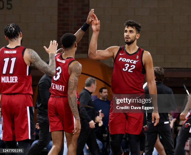 March 3: Ömer Yurtseven of the Sioux Falls Skyforce gets a high five from teammates against the Iowa Wolves at the Sanford Pentagon on March 3, 2023...