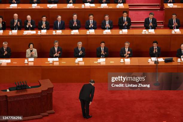 Wang Yang, chairman of the National Committee of the Chinese People's Political Consultative Conference delivers his report during the opening...