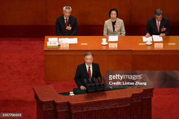 Wang Yang, chairman of the National Committee of the Chinese People's Political Consultative Conference delivers his report during the opening...