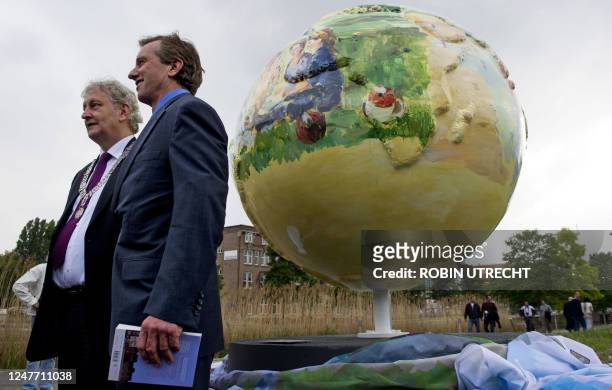Lawyer Robert F. Kennedy Jr. And Amsterdam mayor Eberhard van der Laan attend the opening of the exhibition of Cool Globes in Amsterdam on June 7,...