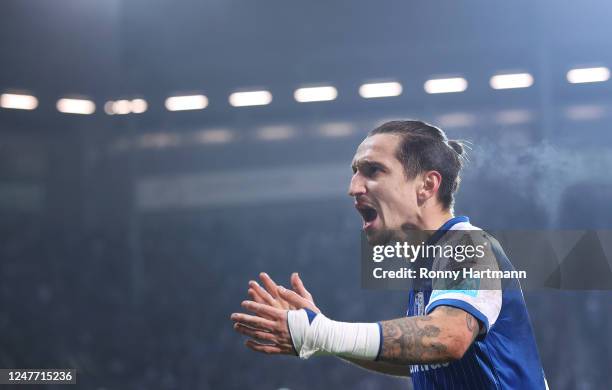 Baris Atik of Magdeburg animates the spectators during the Second Bundesliga match between 1. FC Magdeburg and 1. FC Kaiserslautern at MDCC Arena on...