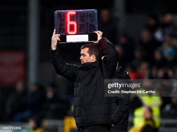 Dublin , Ireland - 3 March 2023; Fourth official Rob Harvey holds up the board showing an additional six minutes of injury time during the SSE...