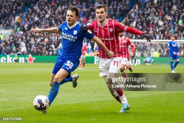 Perry Ng of Cardiff City blocks Anis Mehmeti of Bristol City from getting to the ball during the Sky Bet Championship match between Cardiff City and...