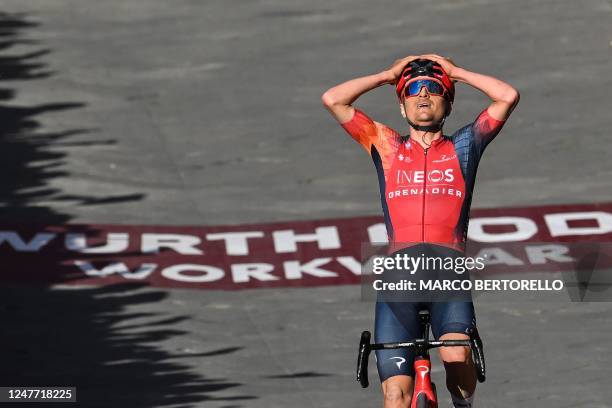 Team Ineos' Thomas Pidcock celebrates as he crosses the finish line to win the 17th one-day classic 'Strade Bianche' cycling race, 184 km between...