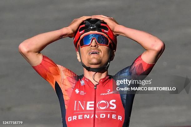 Team Ineos' Thomas Pidcock celebrates as he crosses the finish line to win the 17th one-day classic 'Strade Bianche' cycling race, 184 km between...