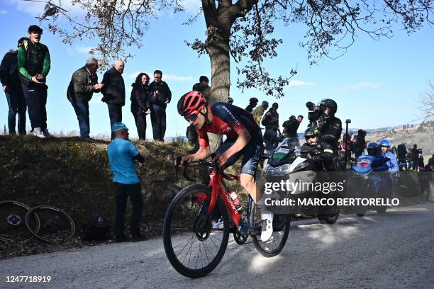 Team Ineos' Thomas Pidcock rides during his winning breakaway in the 17th one-day classic 'Strade Bianche' cycling race, 184 km between Siena and...
