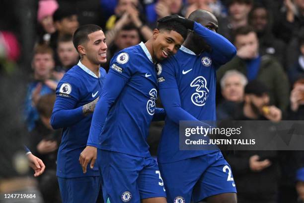 Chelsea's French defender Wesley Fofana celebrates with teammates after scoring the opening goal of the English Premier League football match between...