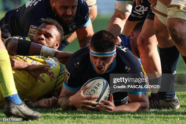 Montpellier's French hooker Vincent Giudicelli scores a try during the French Top14 rugby union match between Montpellier Herault Rugby and ASM...