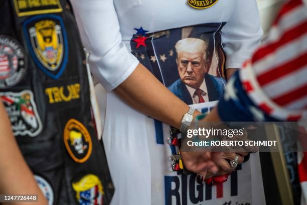 Supporters of former US President Donald Trump attend the 2023 Conservative Political Action Coalition Conference in National Harbor, Maryland, on...