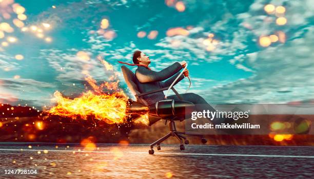 entrepreneur lanches his new project which is a rocket fuelled office chair - launch stock pictures, royalty-free photos & images