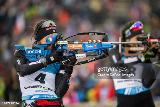 Dorothea Wierer of Italy at the shooting range during the Women 10 km Pursuit at the BMW IBU World Cup Biathlon Nove Mesto on March 4, 2023 in Nove...