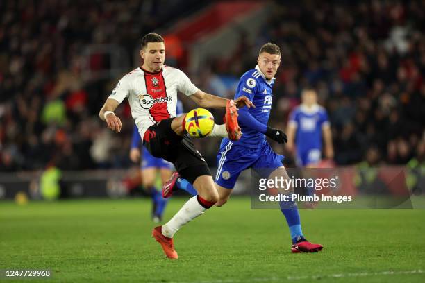 Jan Bednarek of Southampton in action with Jamie Vardy of Leicester City during the Premier League match between Southampton FC and Leicester City at...