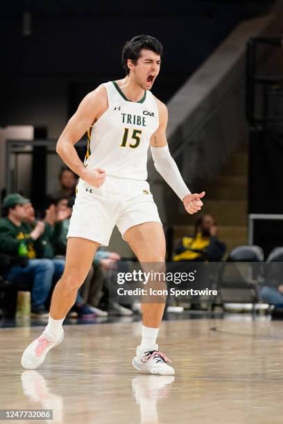 William & Mary Tribe Guard Miguel Ayesa reacts to making a three point shot during the first half of the College Basketball CAA Conference Tournament...