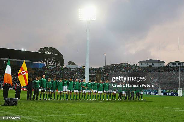 The Ireland team observe a minutes silence in remembrance of victims of the 9/11 terrorist attacks on New York and Washington during the IRB 2011...