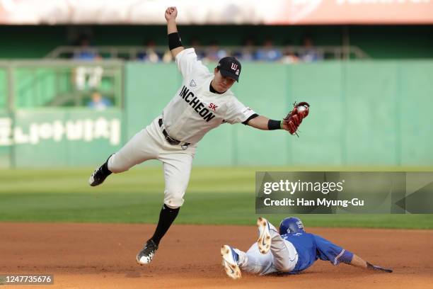 Outfilder Park Chan-Do of Samsung Lions slides in to the second base in the top of the fourth inning during the KBO League game between Samsung Lions...