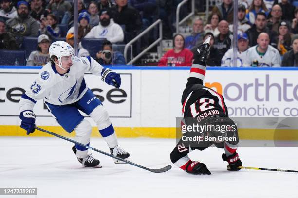Kyle Okposo of the Buffalo Sabres is upset by Michael Eyssimont of the Tampa Bay Lightning during an NHL game on March 4, 2023 at KeyBank Center in...