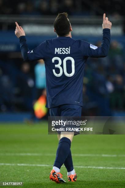 Paris Saint-Germain's Argentine forward Lionel Messi celebrates after scoring a goal during the French L1 football match between Paris Saint-Germain...